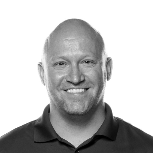 A professional headshot of Danny C. Lockwood.